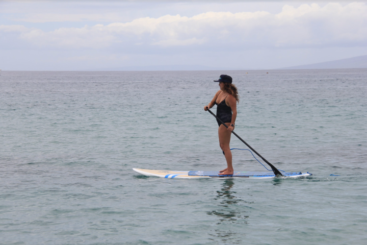 a man riding a surfboard in the water
